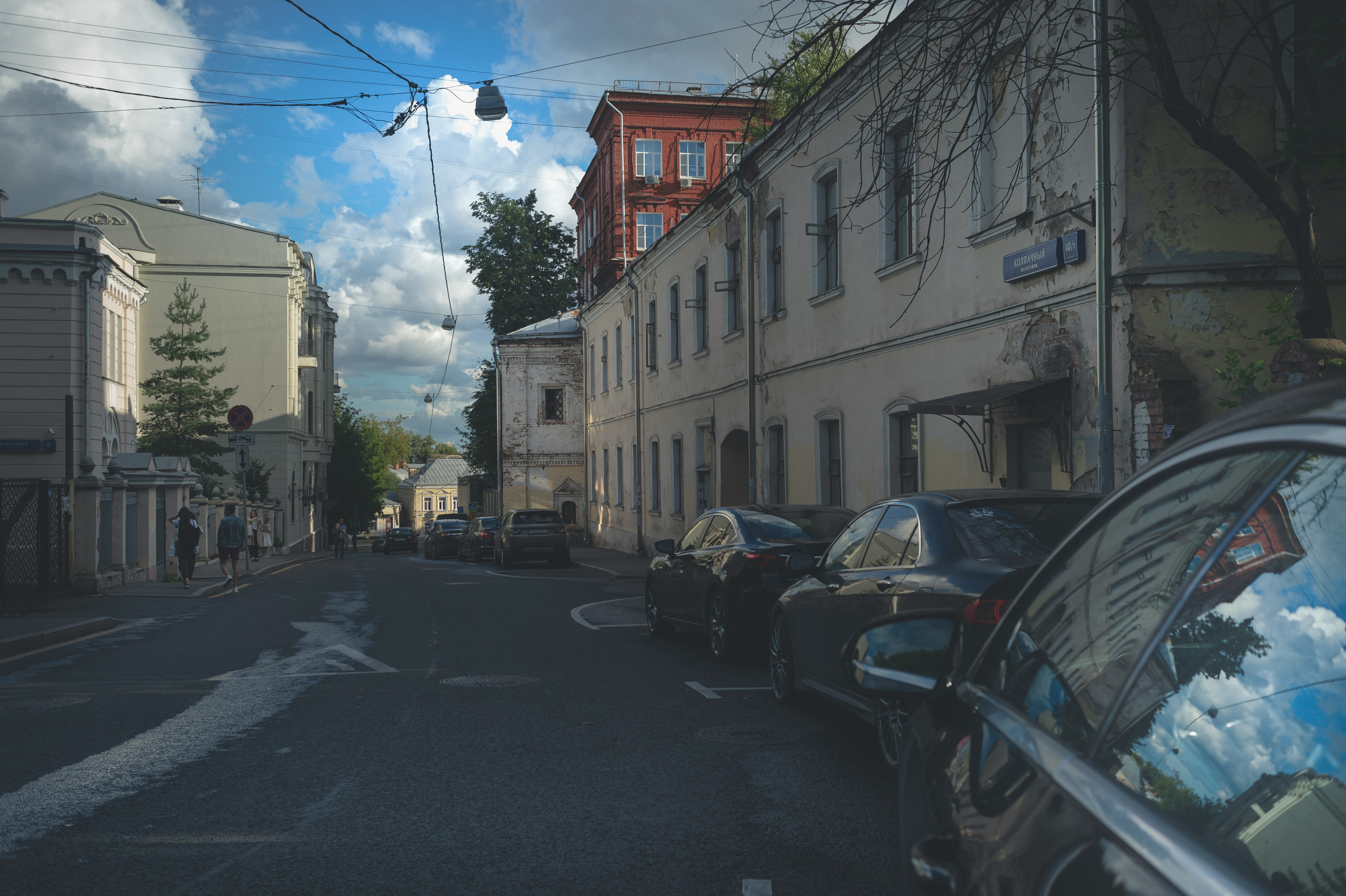 cars parked in front of building during daytime